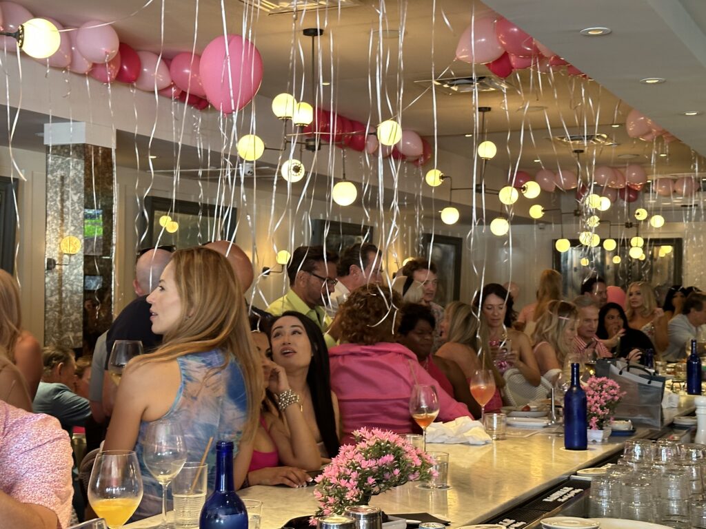 The bar is packed at Brasserie 19 for Le Barbie Brunch (Photo by Shelby Hodge)