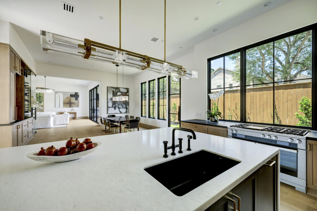 A bounty of windows provide ample lighting for the home at 3628 Locke Lane. (Photo by TK Images for Compass)