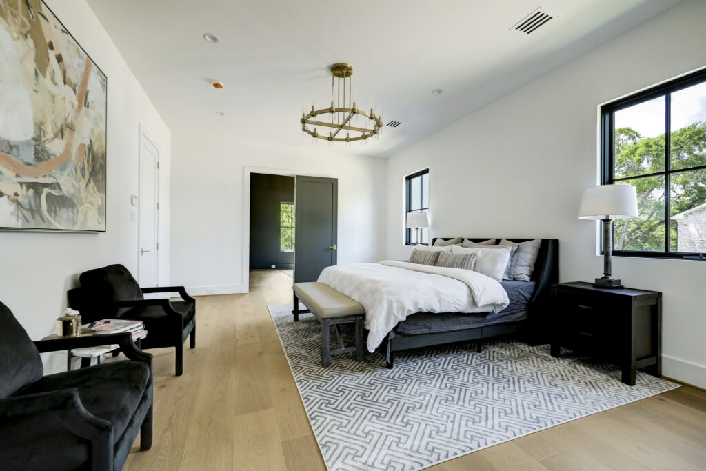 The primary bedroom in the home at 368 Locke Lane in River Oaks. (Photo by TK Images for Compass)