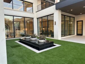 7239 Oak Valley brings a back elevation with its waterfall planter feature that can be viewed from multiple spaces. This is one of Fort Worth’s most expensive mansions.