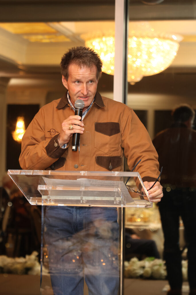 Brad Wyatt, in from the family's South Texas ranch, toasting his parents at the Lynn & Oscar Wyatt birthday/wedding anniversary celebration at the Houston Petroleum Club. (Photo by Priscilla  Dickson)