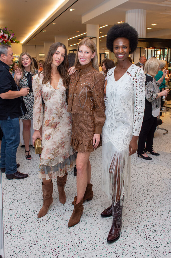 Models suggesting stylish rodeo fashions at the Tootsies salute to Pat Mann Phillips, Houston Rodeo's first female board chair. (Photo by Jacob Power)