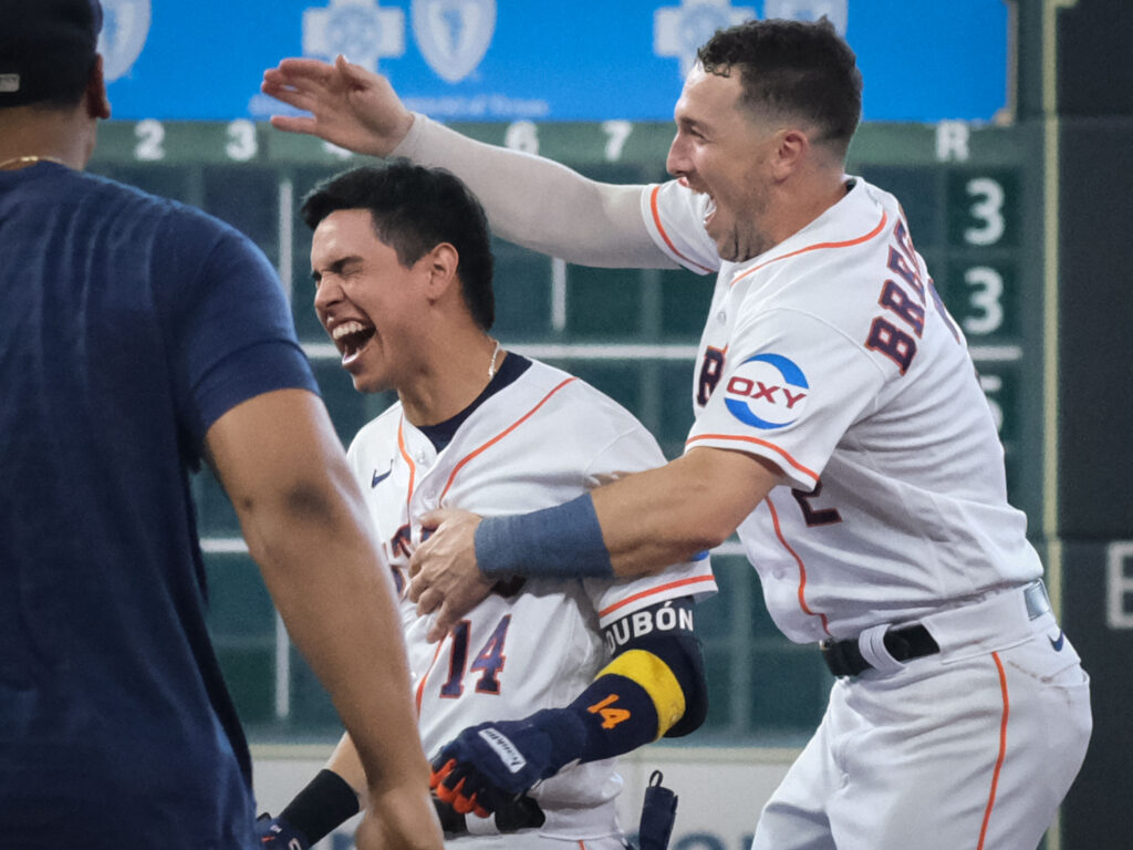 Alex Bregman shows his hops for that Mauricio Dubon bottom of the ninth walkoff win.  (Photo by F. Carter Smith)