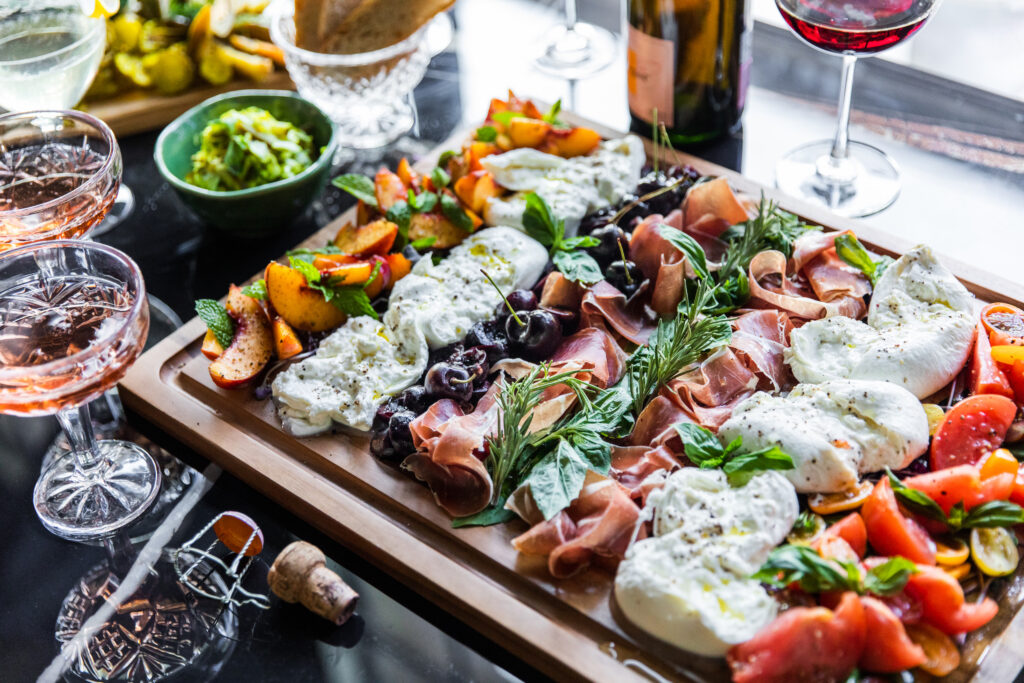 Besides craft-style cocktails, you can can snack on charcuterie-style boards like this burrata board that can feed two to four people at Best Regards. (Photo by Becca Wright)