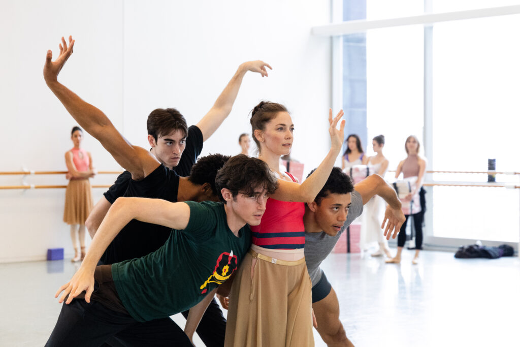 Houston Ballet principal Melody Mennite as Delmira and artists of Houston Ballet rehearsing Annabelle Lopez Ochoa’s "Delmira"
(Photo by Lawrence Elizabeth Knox. Courtesy of Houston Ballet)