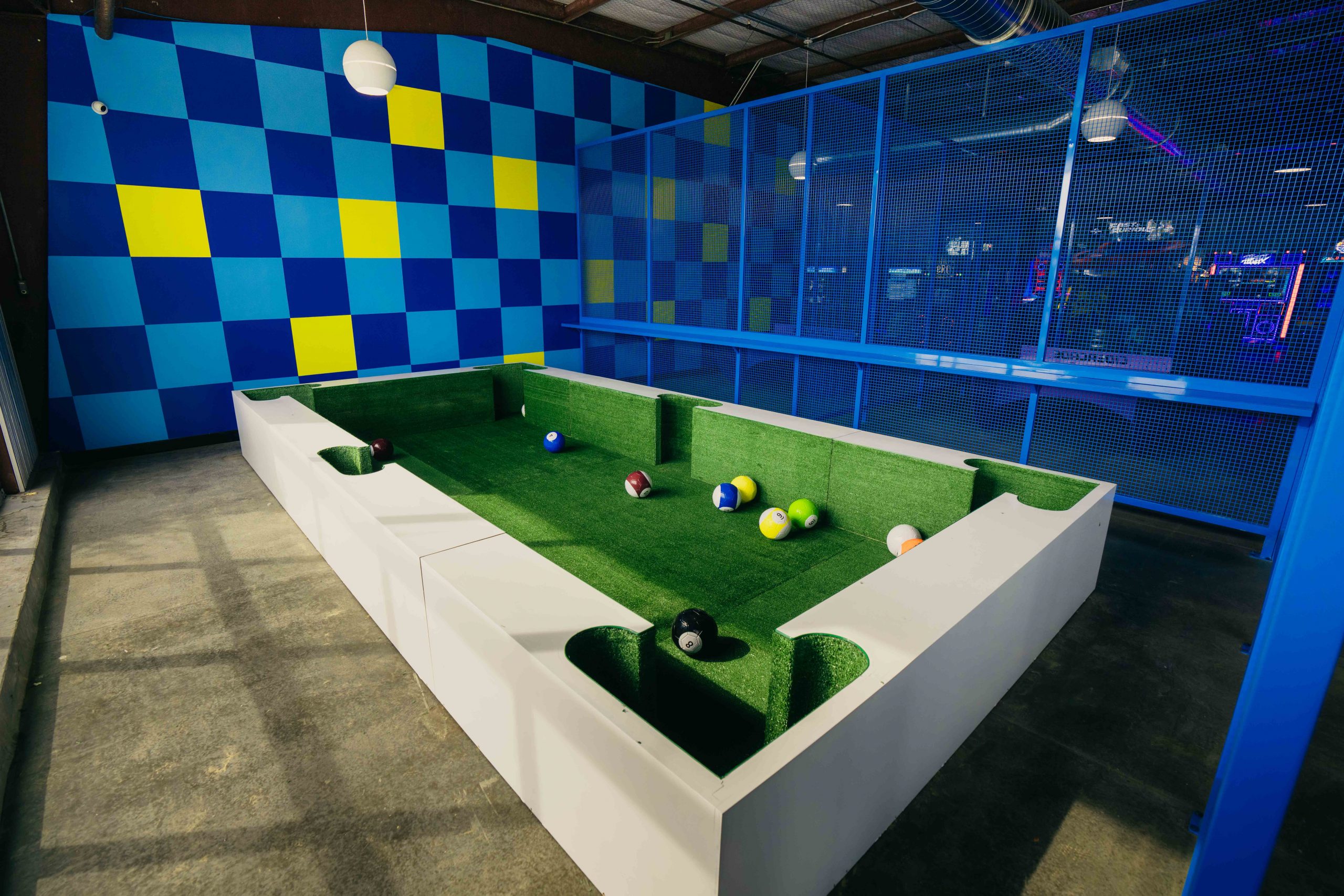 The new fun at Cidercade Arlington includes foot billiards.