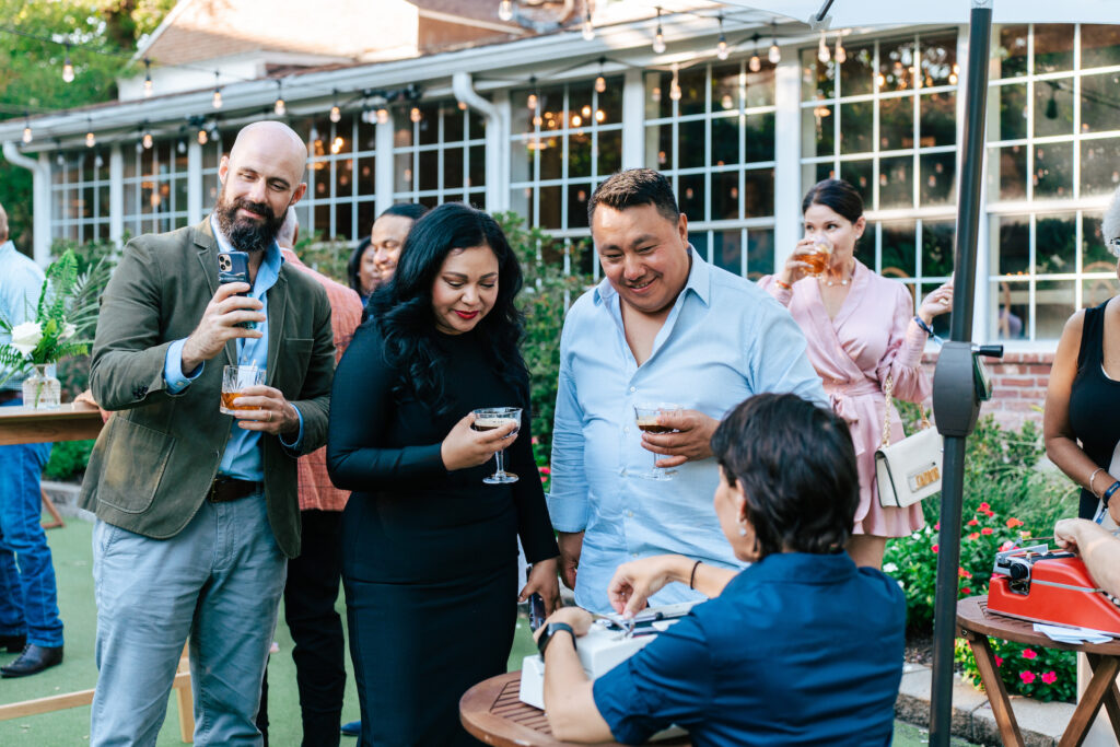 Poets on manual typewriters at the 'Wonders Await at La Casa Brugal'  event at The Manor House at The Houstonian. (Photo courtesy of Brugal 1888)