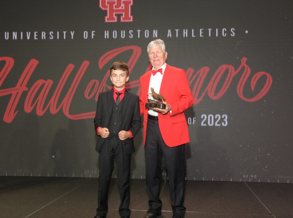 UH baseball great Rick Brewer made sure his grandson Tyler was part of his Hall of Honor moment. (Photo by Eddy Matchette/Courtesy UH Athletics)