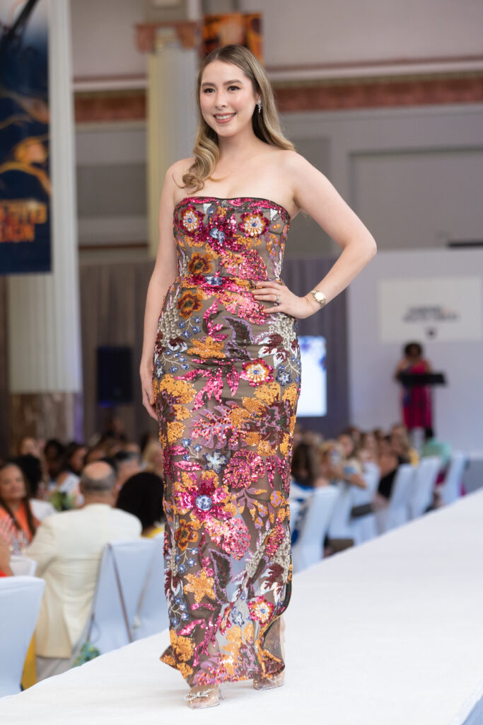 Estetania Urquidy, wife of Astros pitcher José Urquidy, modeling Tootsies fashion on the catwalk at the Astros' 'Champions for Healthy Families' luncheon at Union Station. (Photo by Daniel Ortiz)
