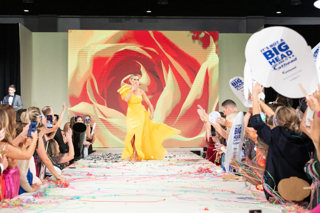 Last year's chair Erin Dore took to the runway at The Walk The Woodlands, which raised vital funds for Interfaith.
