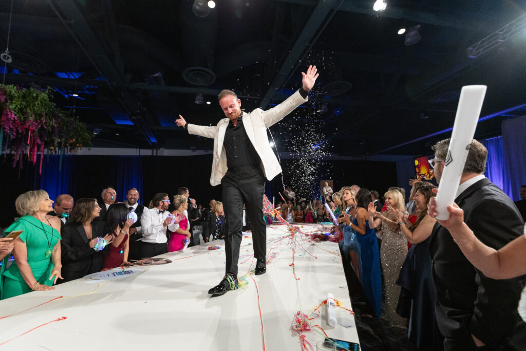 Community Champion Austin Simmons strutted down the runway during The Walk. (Photo by Daniela Weaver)
