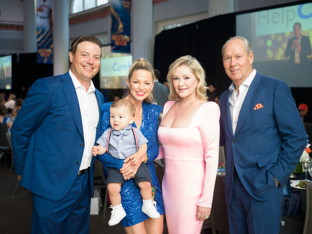 Joe Smith & Allie LaForce with their son Jacob, Whitney & Jim Crane at the HelpCureHD Gala at Union Station in Minute Maid Park.(Photo by Daniel Ortiz)