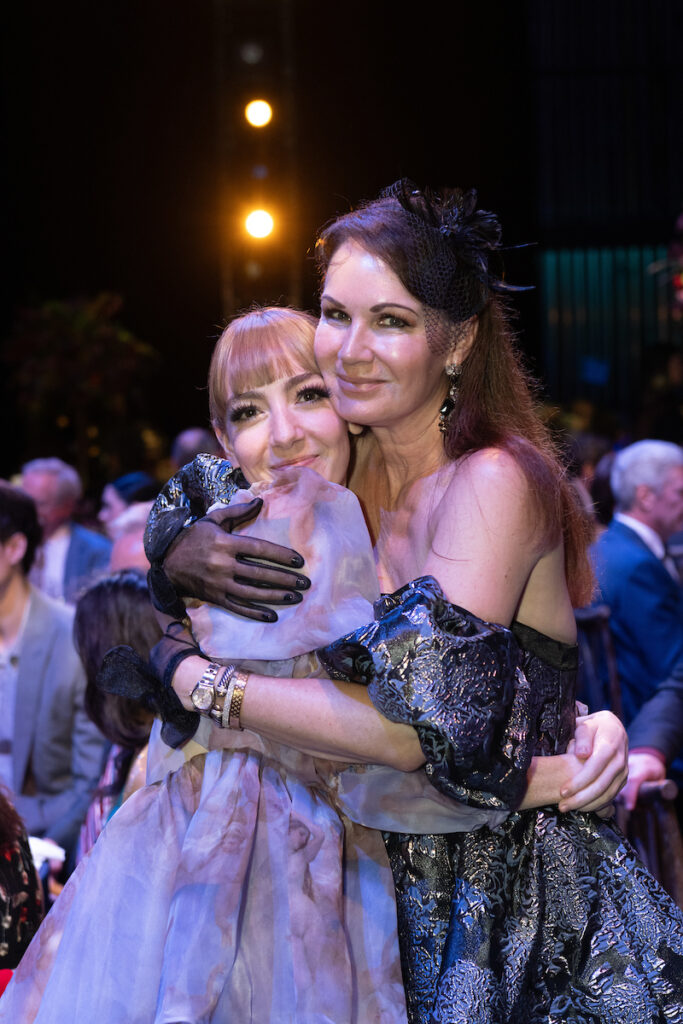 Natalie Varnum, Beth Muecke on stage at Wortham Theater Center for Houston Ballet's Opening Night Dinner. (Photo by Wilson Parish)