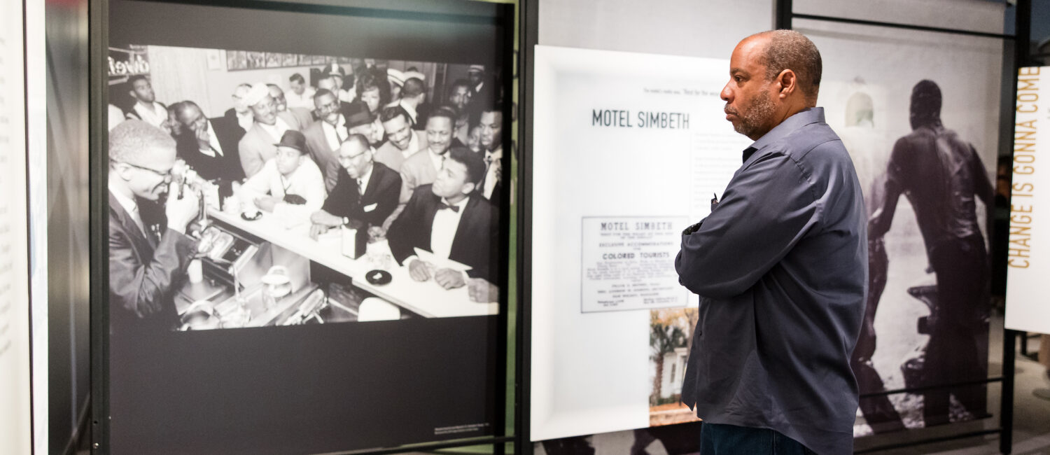 guest studies ‘The Negro Motorist Green Book’ exhibition at Holocaust Museum Houston on view now through November 26. (Photo by Hung L. Truong)