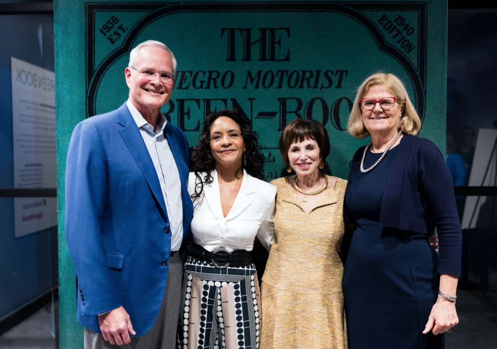 Exxon Mobil chairman and CEO Darren Woods, curator Candacy Taylor, Holocaust Museum Houston board chair Barbara Herz, the Smithsonian's Myriam Springuel at the opening of 'The Negro Motorist Green Book' exhibition. (Photo by Hung L. Truong)