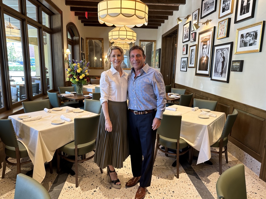 Courtney Hill Fertitta, Johnny Carrabba all smiles at the reveal of the remodeled rooms at Carrabba's on Kirby. (Photo by Shelby Hodge)
