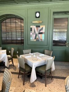 Paneling and touches of artwork define the remodeled Kirby Room at Carrabba's on Kirby. (Photo by Shelby Hodge)