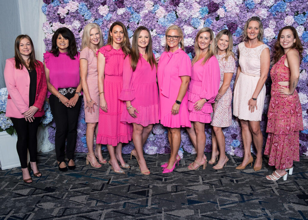 Woodforest Bank and Woodforest Charitable Foundation guests at the "In the Pink" luncheon at The Woodlands Waterway Marriott included Amy Sechelski, Patricia Brown, Angie Mayrant, Jennifer Hoffman, Brenda Wendt, Christin Allphin, Audrey Winkle Annie Bradbury, and Flannery Lenz. (Photo by John Lynch Photography)