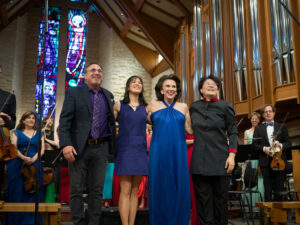 1. Anthony DiLorenzo, composer, Cynthia Wong, animator, Lois Stark, author, and Conductor, Mei-Ann Chen at the premiere of Techtonal based on The Telling Image (Photo by Daniel Ortiz)