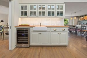 412 Hazelwood – Modern butcher block topped wet bar adds to entertainers layout.