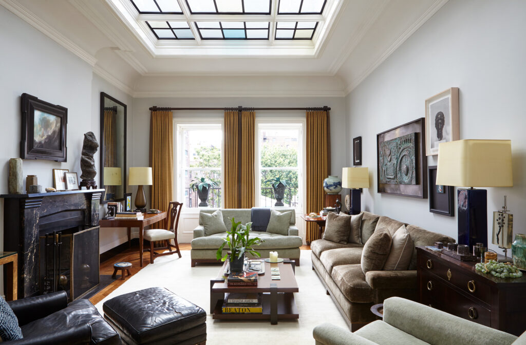 A living room designed by Sawyer | Berson.  The salvaged fireplace was found in New York. (Photo by Joshua McHugh)