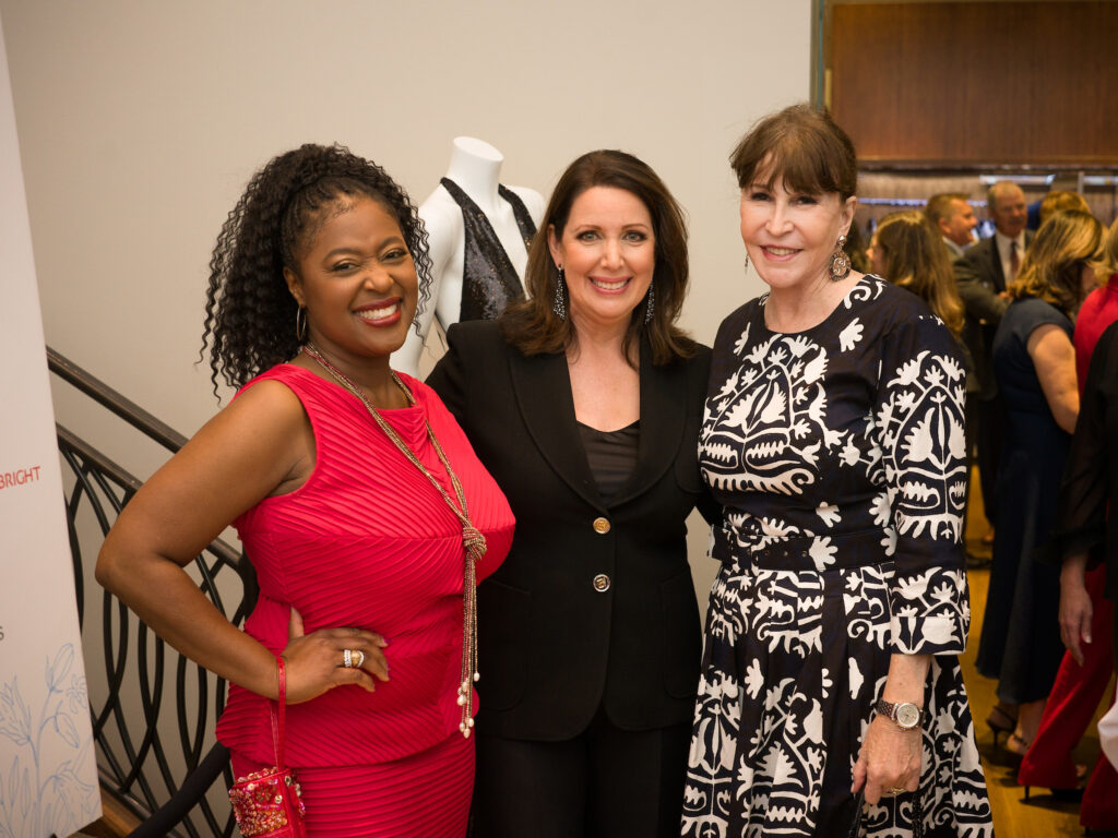 Sharron Melton, Julie Roberts, Shelby Hodge at the Elizabeth Anthony Go Red for Women fashion event. (Photo by Daniel Ortiz)
