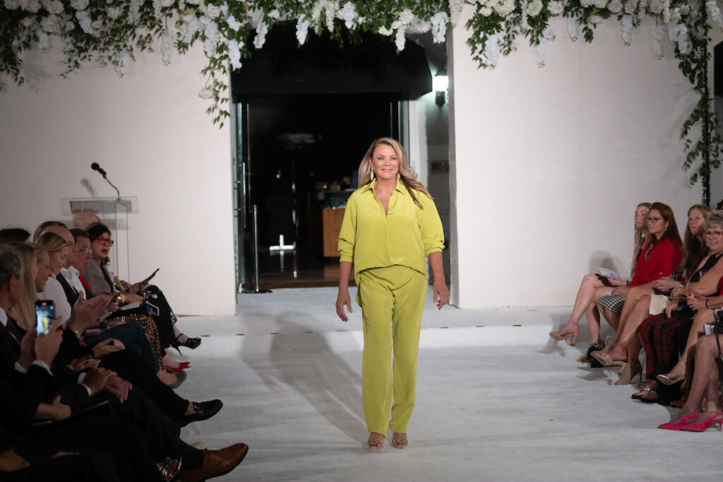 Cindy Cook on the runway at the Elizabeth Anthony Go Red for Women fashion event. (Photo by Daniel Ortiz)