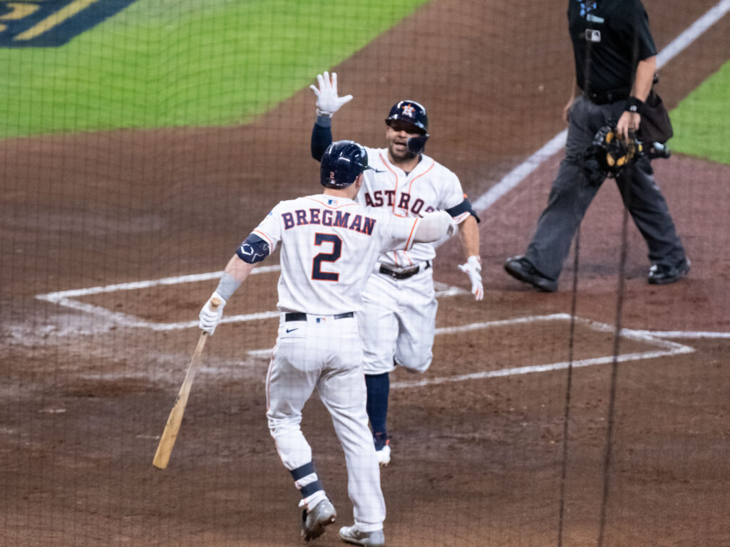 Alex Bregman is waiting to celebrate another Jose Altuve home run. (Photo by F. Carter Smith)