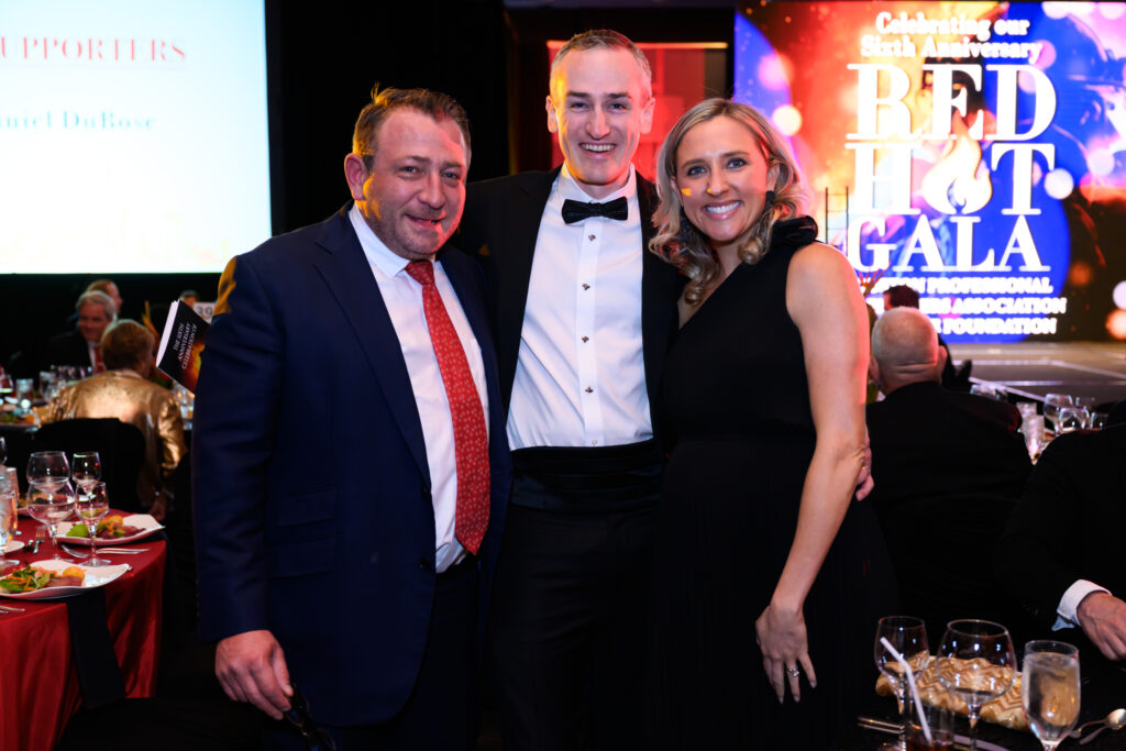 Honoree Ben Berg, Tug & Emily Hanley   at the 'Red Hot Gala' benefitting the Houston Firefighters Foundation. (Photo by Michelle Watson)