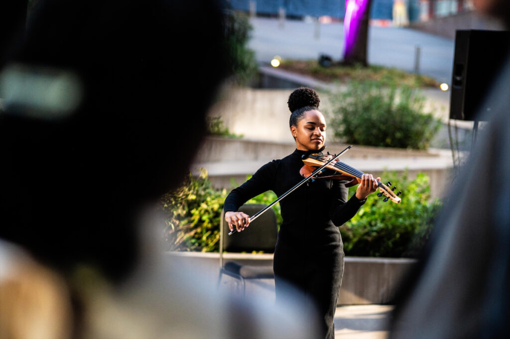 Clover the Violinist at Turn Up The Lights, AT&T Performing Arts Center’s ongoing fundraising event series.
