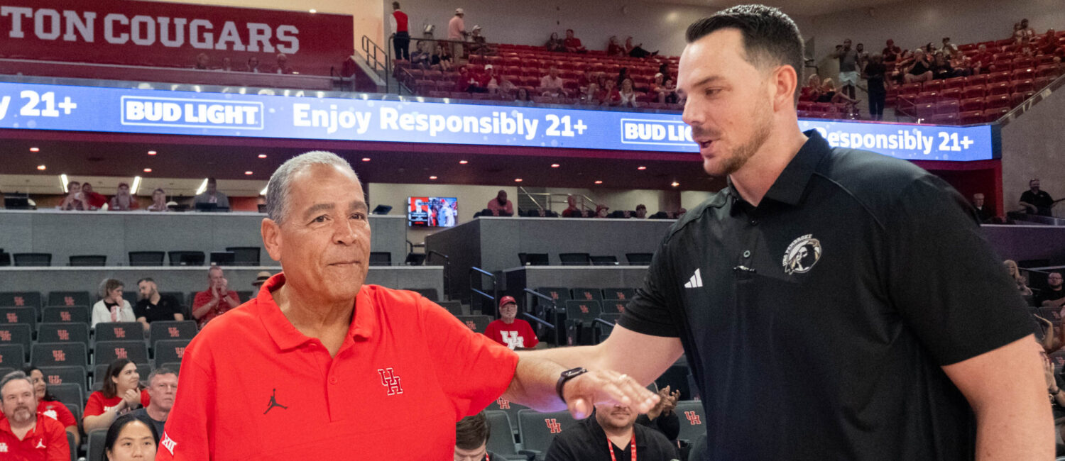 University of Houston head coach Kelvin Sampson visited with Drew Richards, head coach of the UNC Pembroke Braves, his alma mater, before an exhibition contest