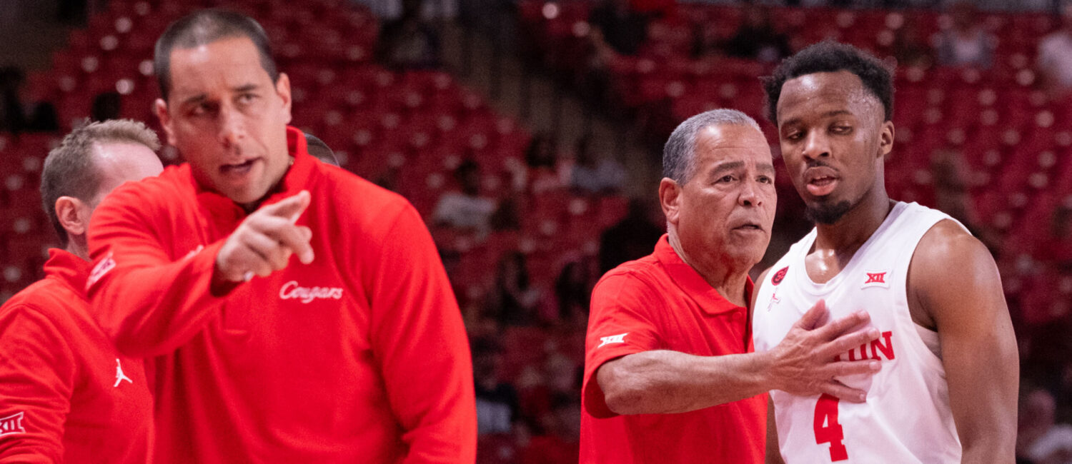 UH coaches Kellen Sampson and Kelvin Sampson know that teaching even experienced players like LJ Cryer is a process. (Photo by F. Carter Smith)