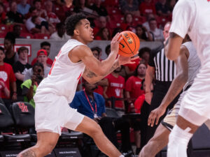 University of Houston head coach Kelvin Sampson visited with Drew Richards, head coach of the UNC Pembroke Braves, his alma mater, before an exhibition contest