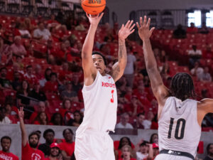 University of Houston head coach Kelvin Sampson visited with Drew Richards, head coach of the UNC Pembroke Braves, his alma mater, before an exhibition contest