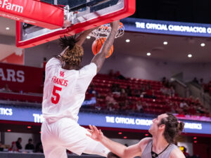 University of Houston head coach Kelvin Sampson visited with Drew Richards, head coach of the UNC Pembroke Braves, his alma mater, before an exhibition contest