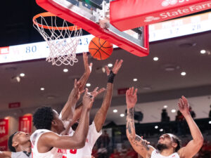 University of Houston head coach Kelvin Sampson visited with Drew Richards, head coach of the UNC Pembroke Braves, his alma mater, before an exhibition contest