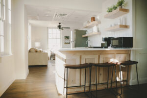 Crazy – Water Hotel rooms include full kitchens and modern amenities.