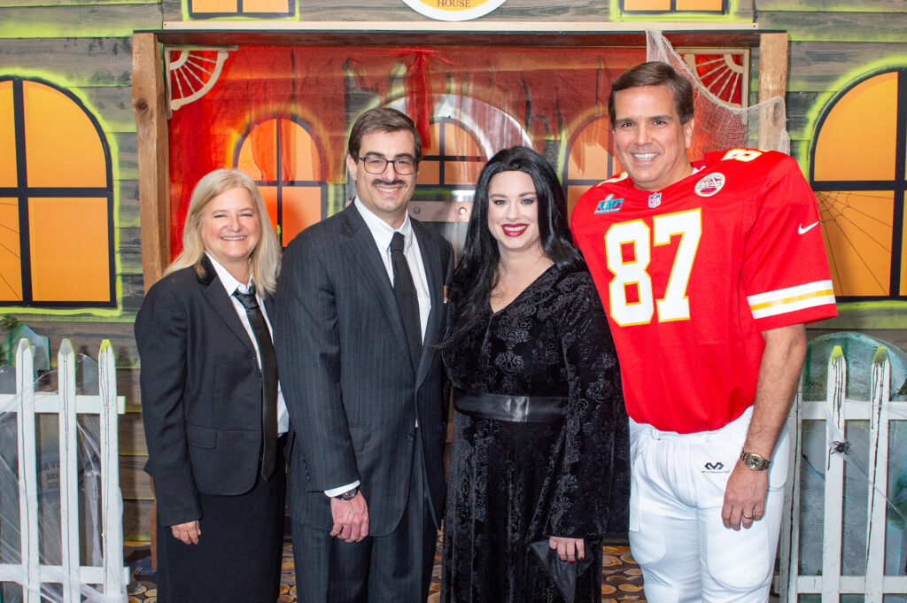 Ronald McDonald House Houston CEO Cristina Vetrano, chairs Wells & April McGee, aka Gomez & Morticia Addams, board president Dan Connally at the Ronald McDonald House Houston Boo Ball (Photo by Jacob Power)