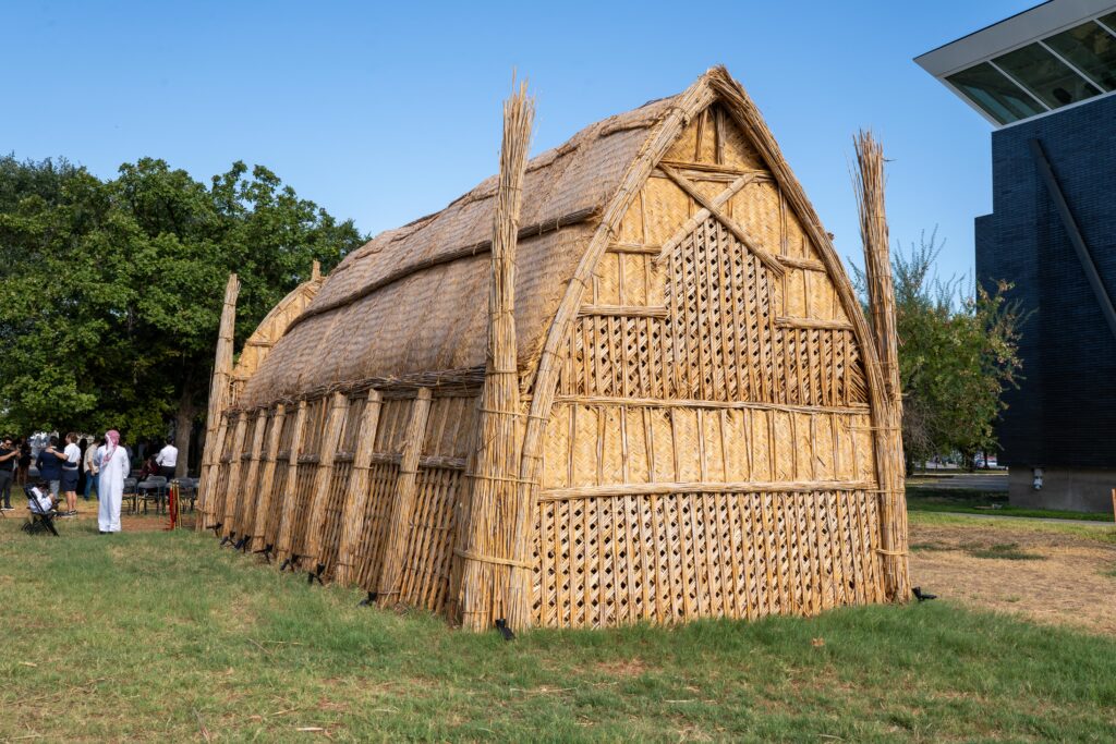 The mudhif’s intricate design was designed by a master builder who harvested the reeds in the marshes of Iraq. Volunteers and local organizations came together this summer to assemble the mudhif which stands next door to Rice University's Moody Center for the Arts.  (Photo by Henrich Perez)