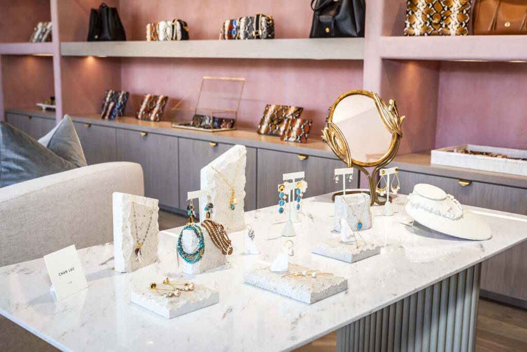 Jewelry handmade by global artisans lines the shelves. Photo by Toman Imagery.