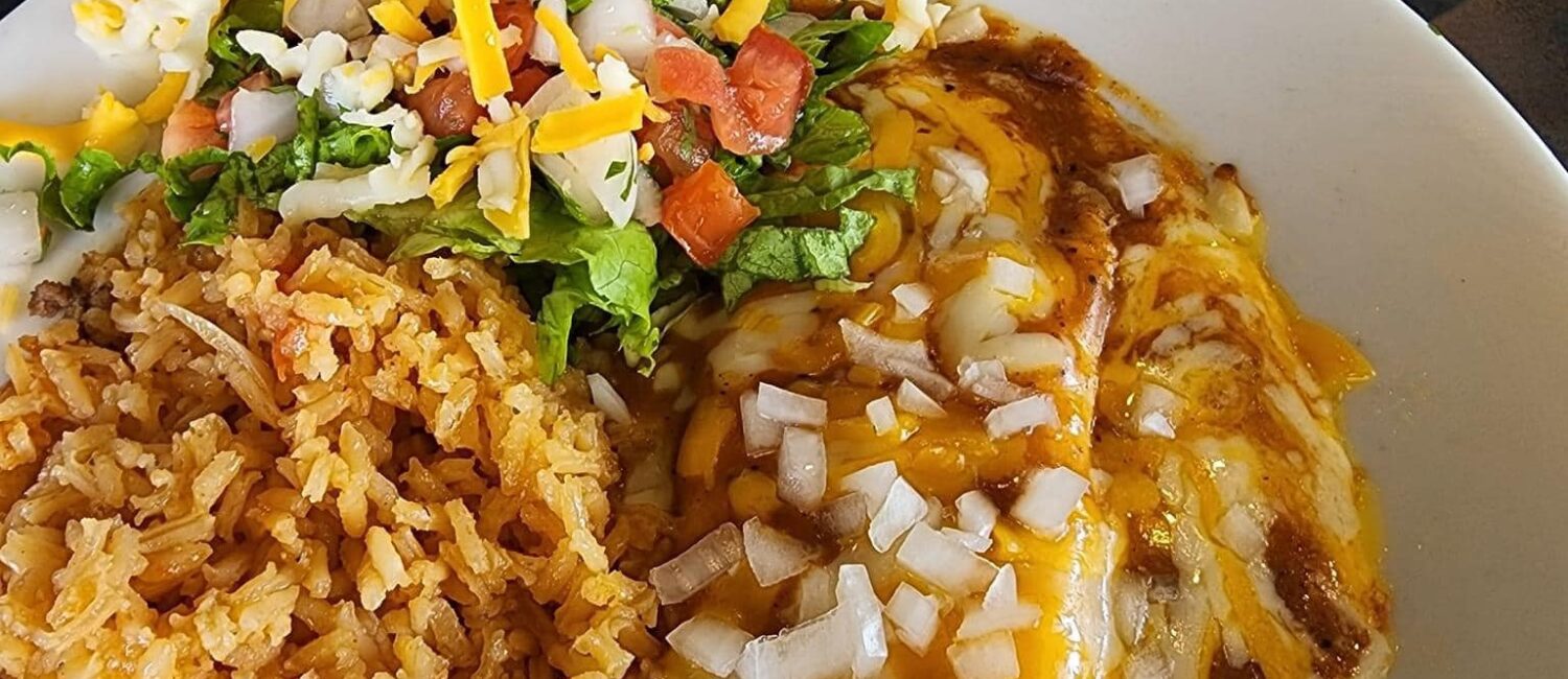 Enchilada’s Ole – fluffy rice made fresh throughout the day sides some saucy enchiladas.