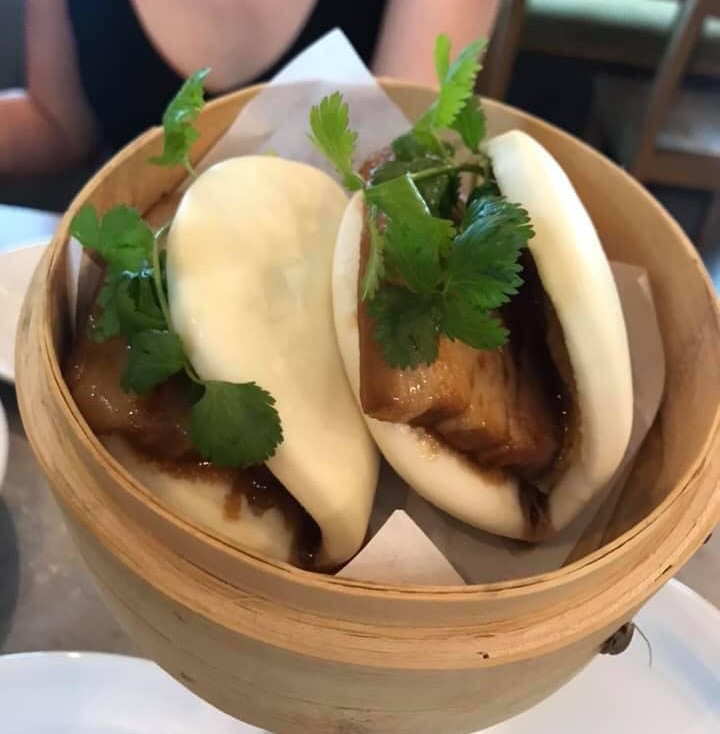 Four Sisters famous pork belly boa buns are headed to Mansfield soon, along with traditional favorites by Tuan's mother chef Hai Pham. 