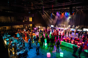 Guests enjoying Manhattan Band in Potter Rose Performance Hall
