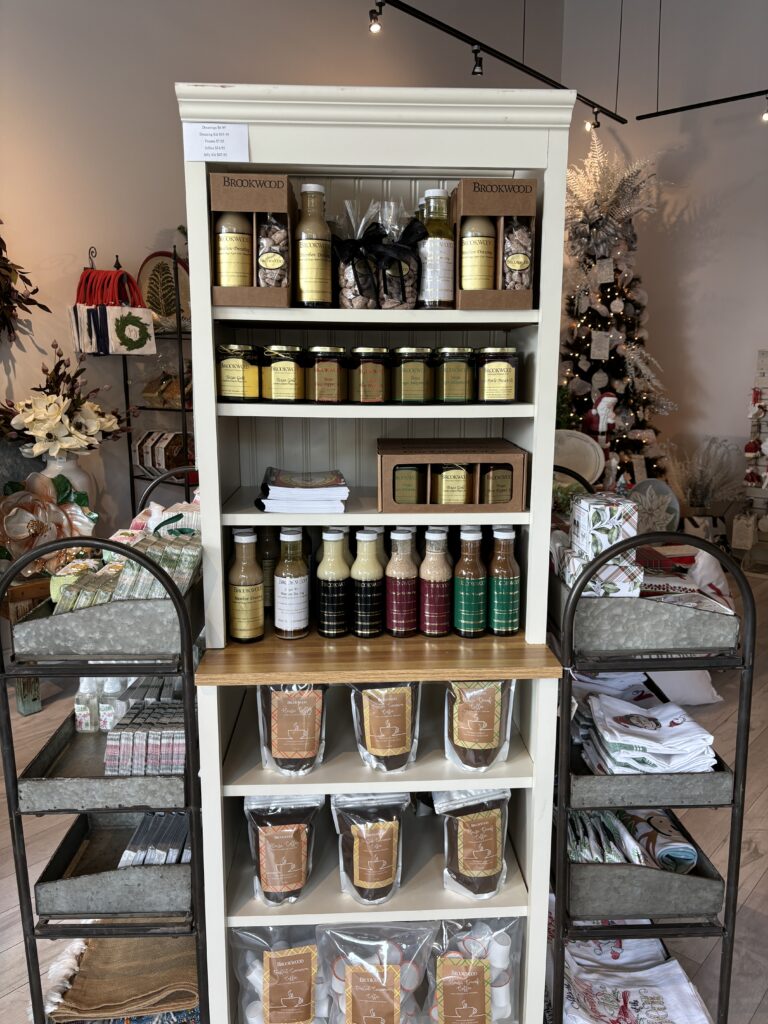 Salad dressings, used at the cafe in Brookshire, are for sale in the pop-up. (Photo by Laura Landsbaum)