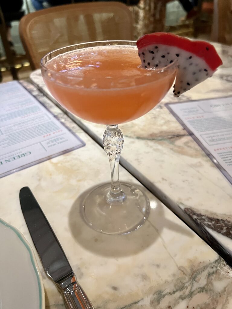 The Unleash the Dragon cocktail at Green Point is a delicious mix of vodka, Aperol, dragonfruit syrup, and more. (Photo by Megan Ziots)