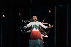 J’Nai Bridges surrounded by Urban Bush Women