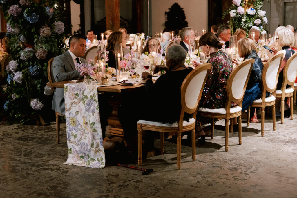 Runners on the dinner tables at the New Orleans Auction Galleries were from designer Timothy Corrigan's collection of fabric designs.