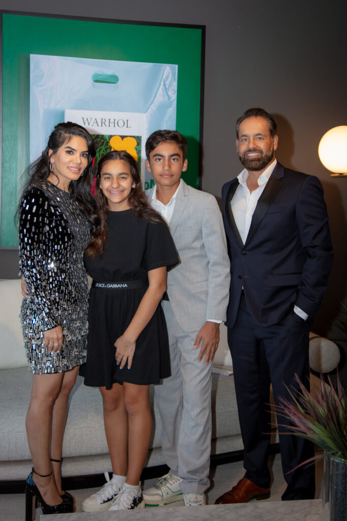 Nina & Karun Magon with their children Alina and Aryan at the book signing at BeDesign. (Photo by Miroma Photography)