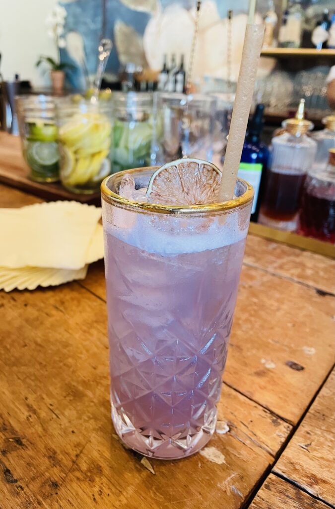 Ellerbe’s new cocktail called Rif Ram Bah Zoo gets its color from Japanese ube. (Photo by Courtney Dabney)