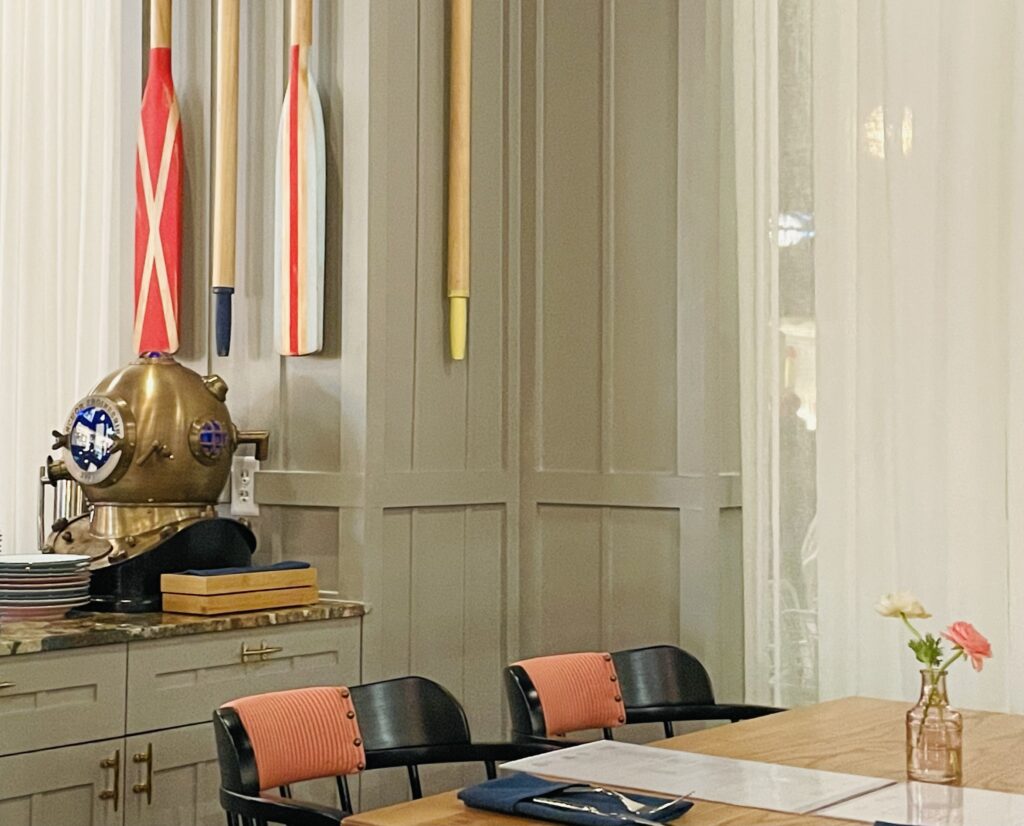 Plank Seafood Provisions styled with antique diver's helmets and colorful oars. (Photo by Courtney Dabney)